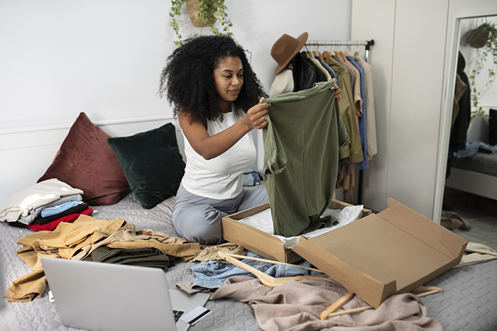 woman decluttering her closet