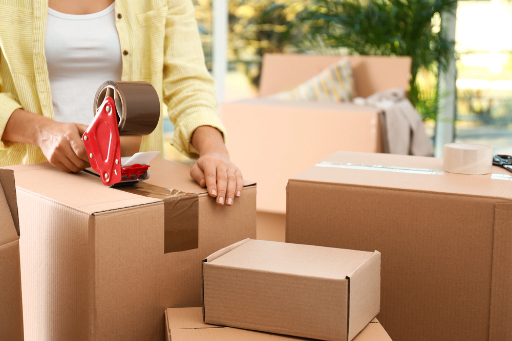 Woman packing boxes